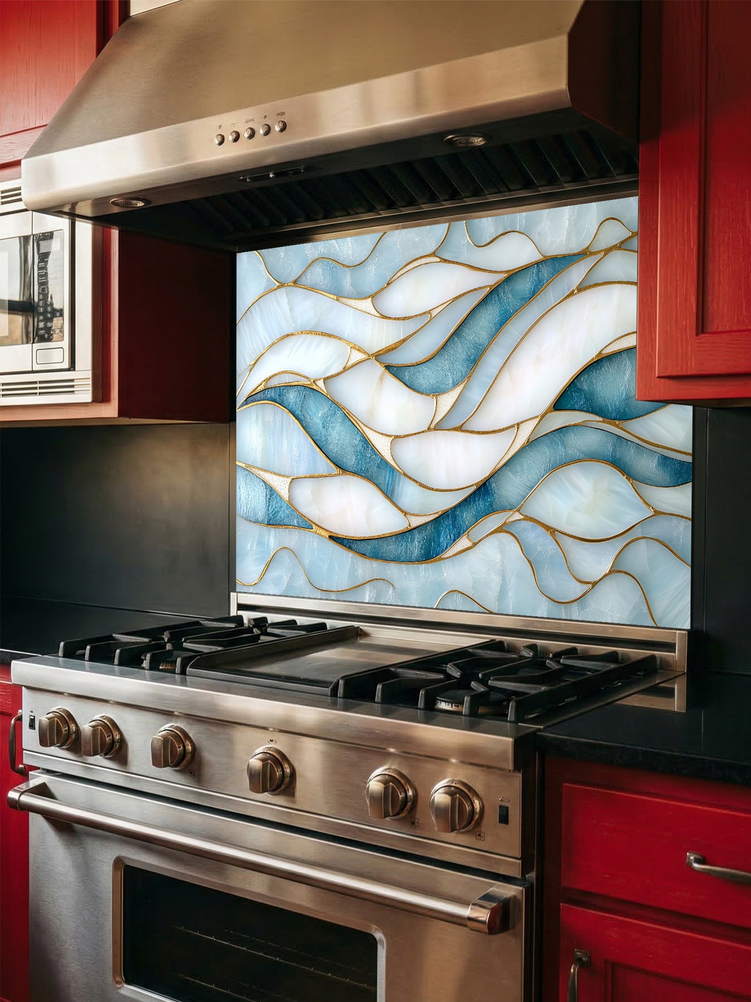 Tempered glass kitchen backsplash featuring a calming modern abstract wave design in faux stained glass with blue, teal, and pearlescent white sections separated by elegant gold lines, installed behind a modern stainless steel stove.