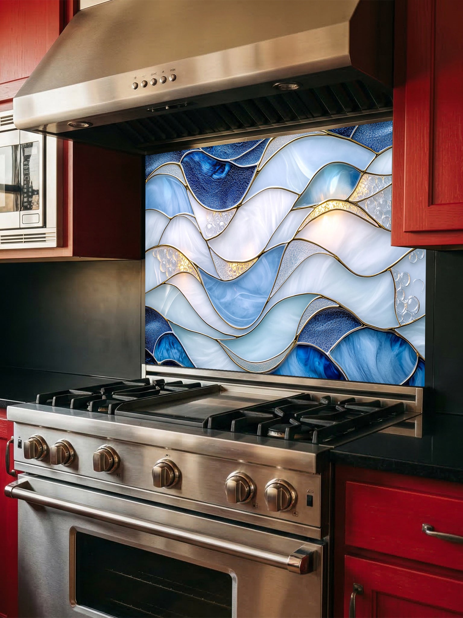 A modern kitchen featuring a tempered glass backsplash with a luxurious abstract fluid art design of blue and white waves with 3D-effect gold veins, installed behind a stainless steel stove.