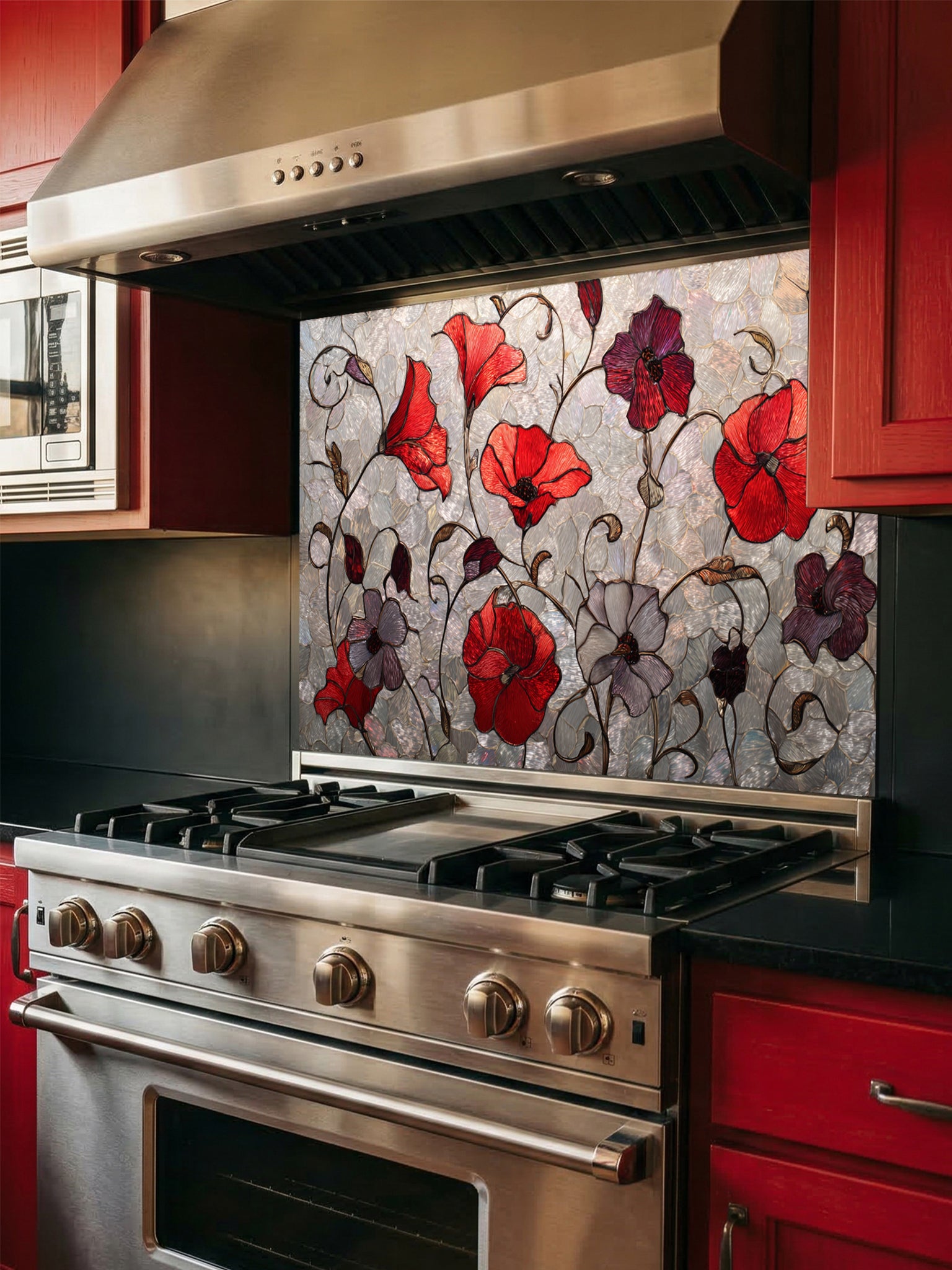 Tempered glass kitchen backsplash featuring a faux stained glass design of vibrant red and purple poppy flowers with elegant curving stems against a textured silver mosaic background, installed behind a modern stainless steel stove.