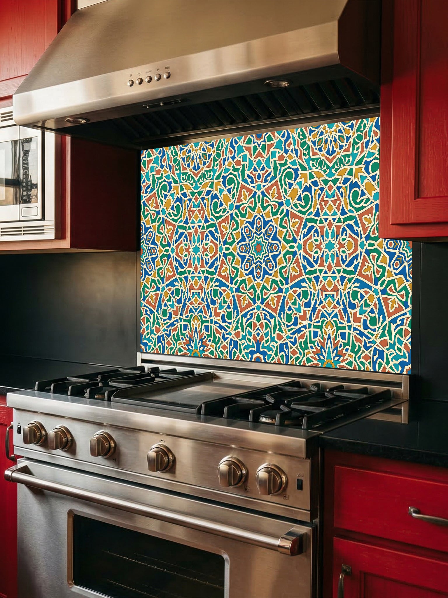 Stainless steel oven with colorful geometric patterned backsplash in a kitchen setting.