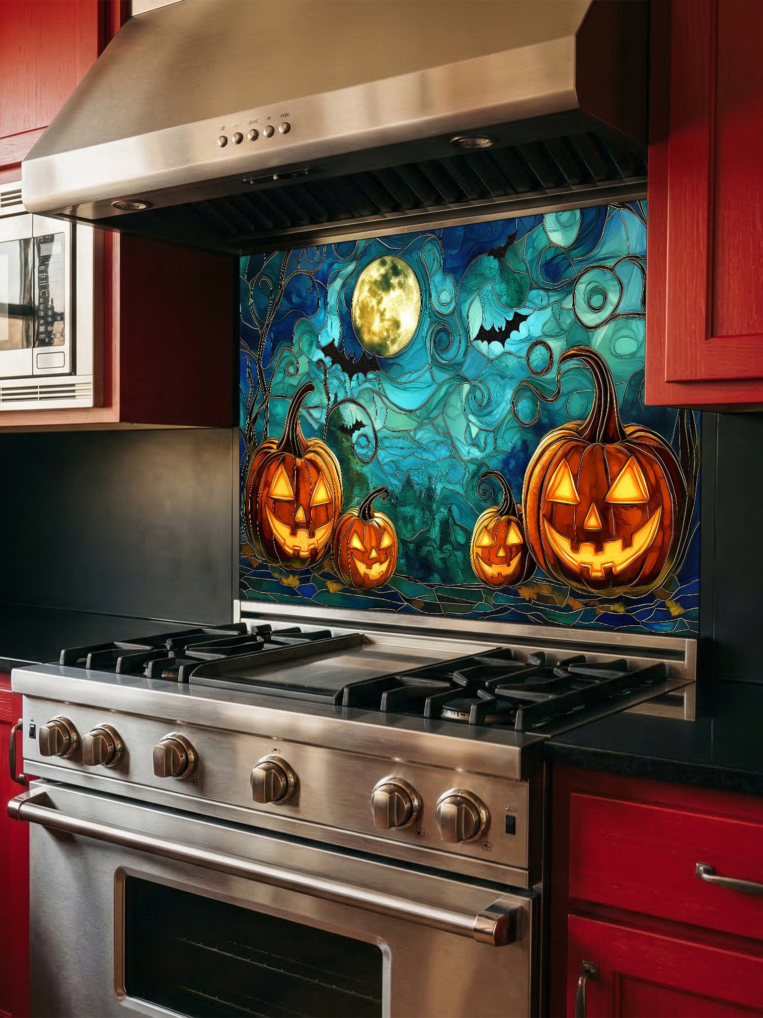Decorative Halloween backsplash with pumpkins and a full moon above a kitchen stove.