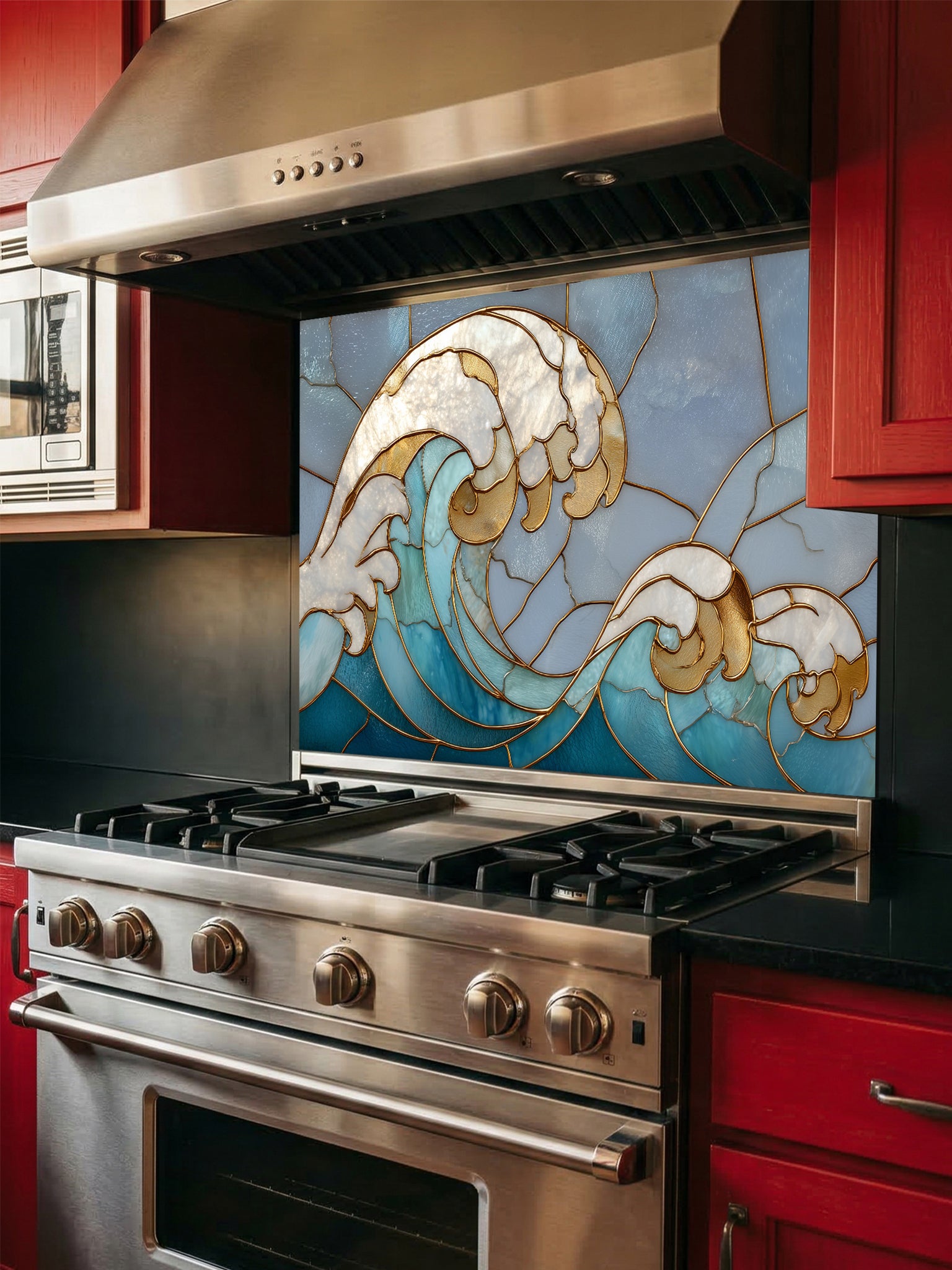 Tempered glass kitchen backsplash featuring a dramatic crashing ocean wave design in faux stained glass with deep blue water, white foam crests, and elegant gold outlines, installed behind a modern stainless steel stove.