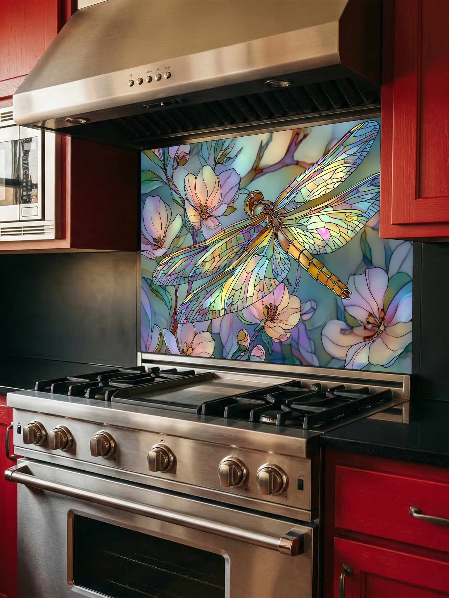 Tempered glass kitchen backsplash featuring a highly realistic 3D illusion of Art Nouveau stained glass showing an elegant dragonfly with iridescent translucent wings resting among soft pastel pink and mint green blooming flowers, installed behind a modern stainless steel stove.