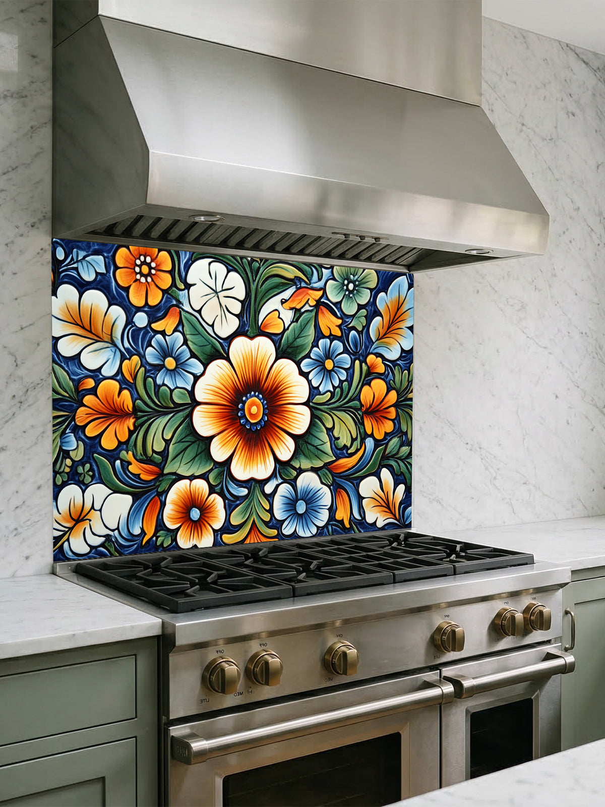 Vibrant Mexican Talavera style floral pattern in blue, orange, and green, UV printed on a smooth tempered glass kitchen backsplash, installed behind a modern stove.