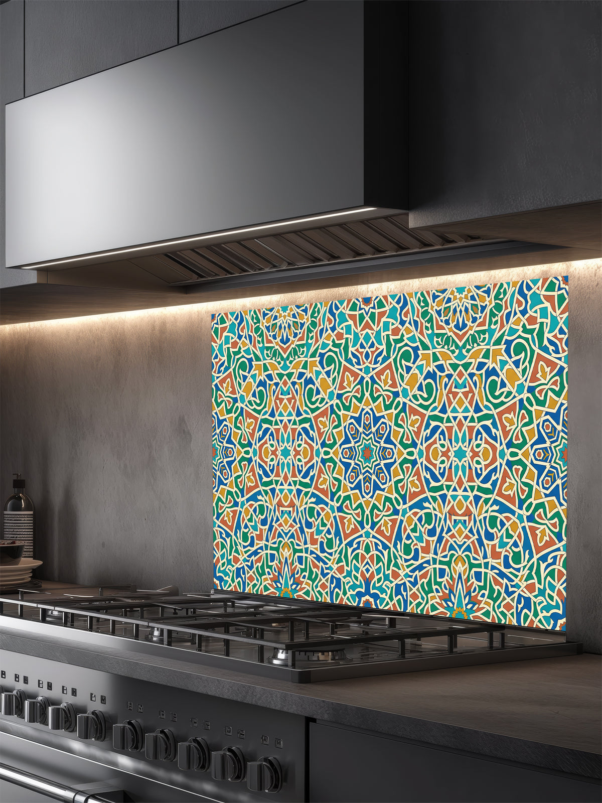 Colorful patterned glass splashback behind a kitchen stove