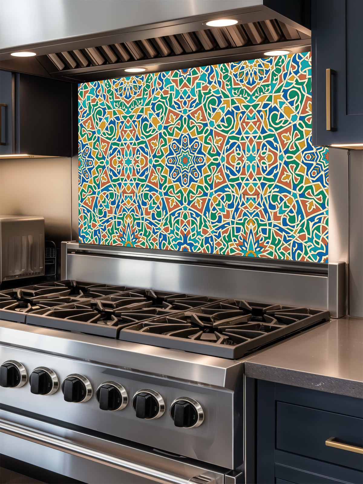 Stainless steel stove with a colorful geometric patterned backsplash in a kitchen setting.